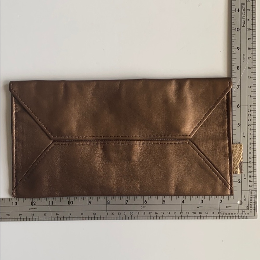 Limited edition 
Hand made in Italy Clutch by JZAR